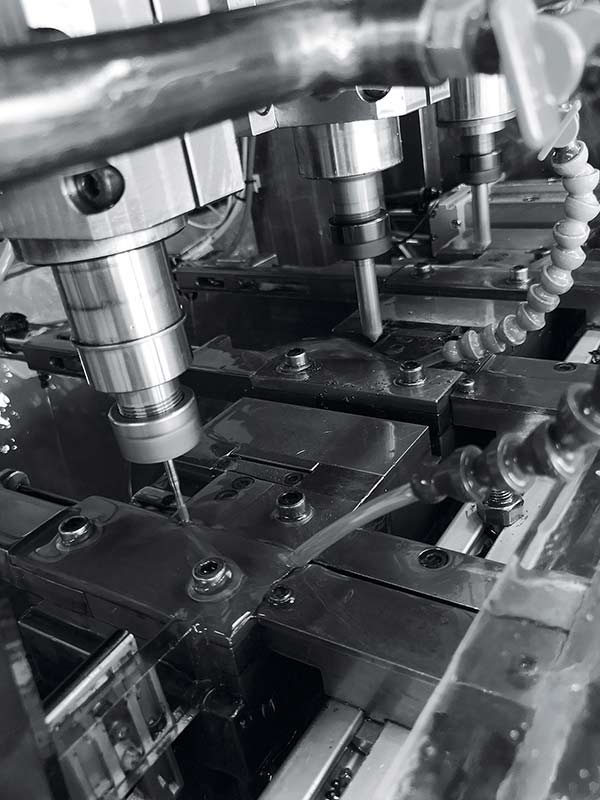 Multi-spindle CNC machine for precision parts manufacturing