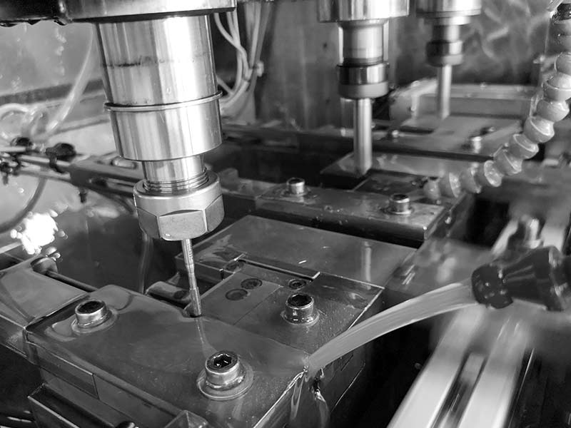 Multi-spindle CNC machine for precision parts manufacturing