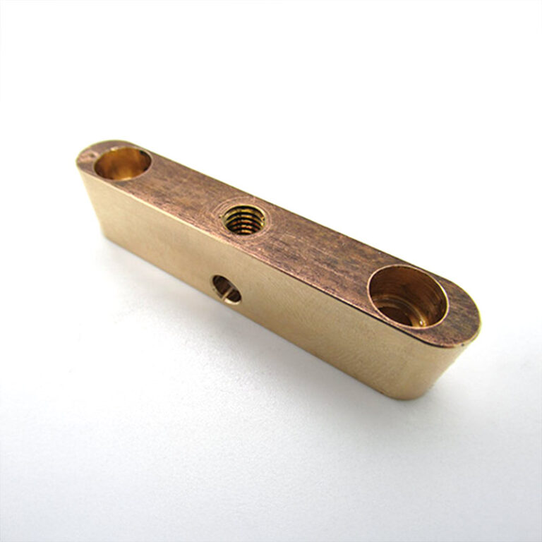 Custom brass part with three bores