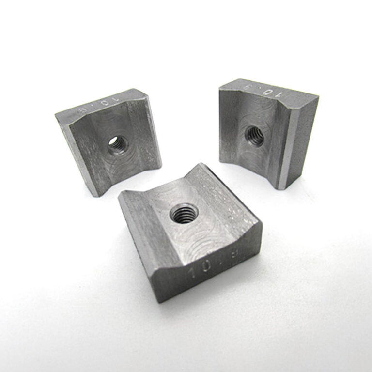 Three milled parts with threaded bore and radius contour