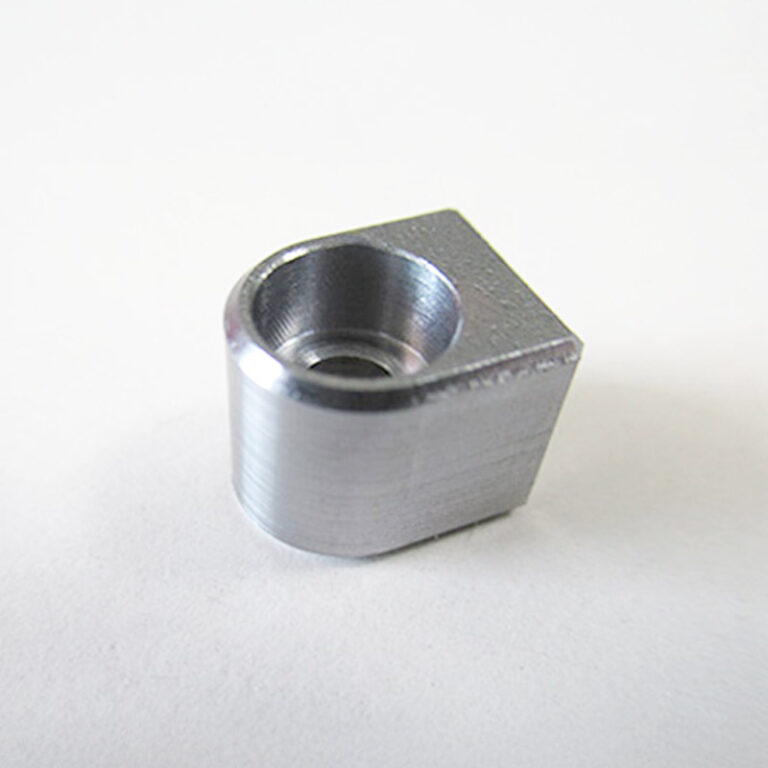 Milled part with recess and thread