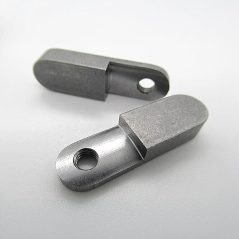 Shaped part with step and hole